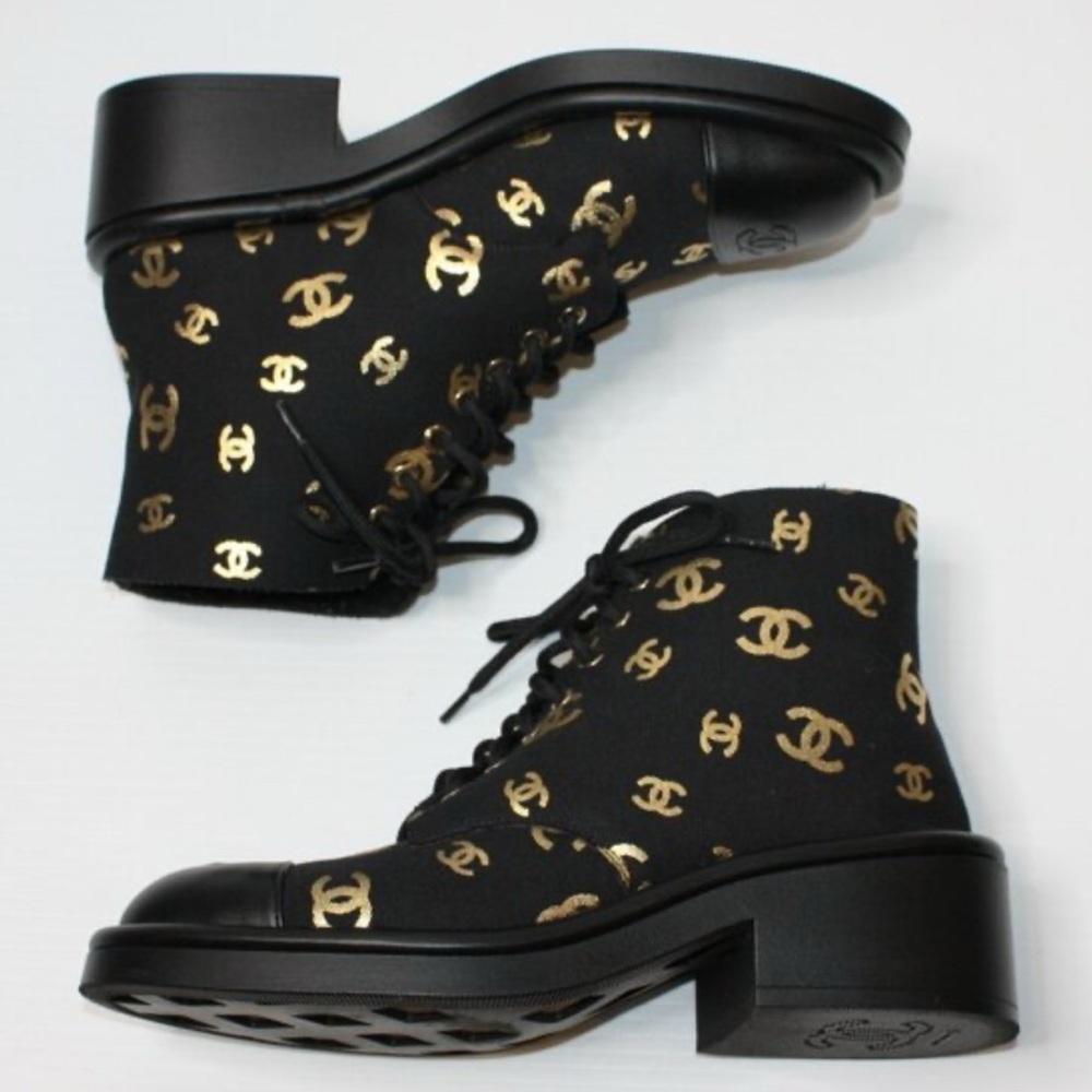 Black Chanel CC printed fabric and lambskin shearling fur boots
